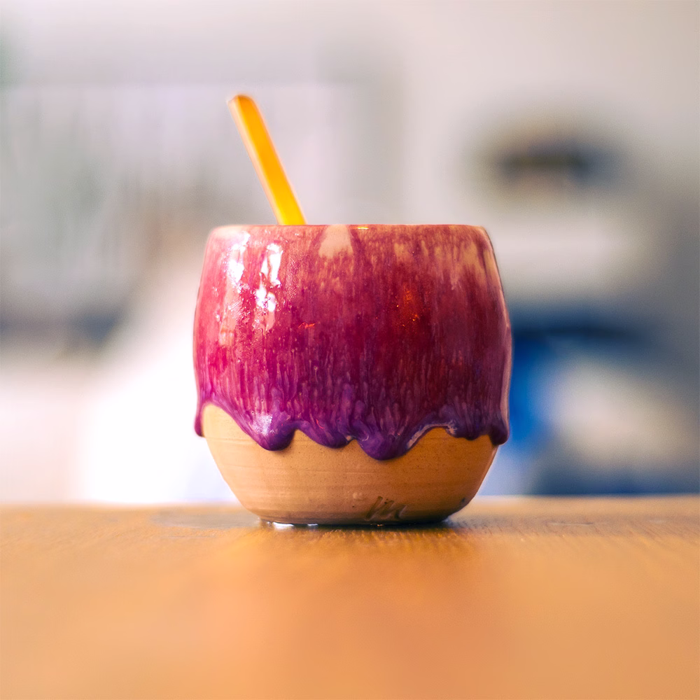 handmade ceramic cup with melting glaze